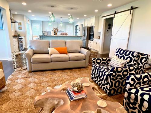 a living room with a couch and a table at 2420 Seabrook Island Rd in Johns Island