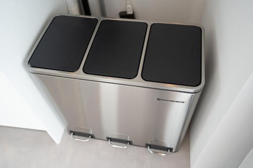 two toaster ovens sitting on top of a wall at Tamagusuku Terrace in Nanjo