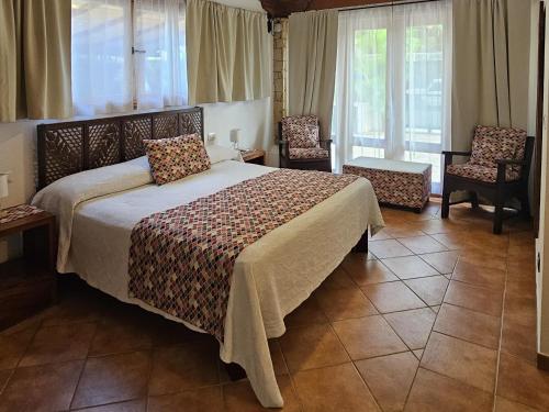 Postel nebo postele na pokoji v ubytování Villas Kalimba