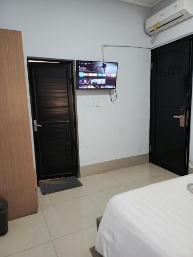 Katil atau katil-katil dalam bilik di Stariez Karawaci