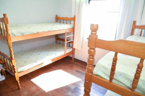 Postel nebo postele na pokoji v ubytování Chacara bella vitta