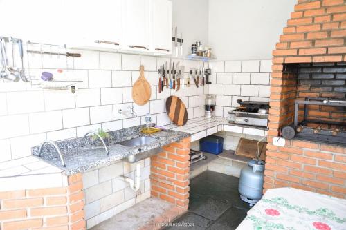 Kuchyň nebo kuchyňský kout v ubytování Chacara bella vitta