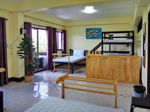 Postel nebo postele na pokoji v ubytování Inncome Hostel