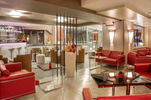 Zona de estar de Hotel Domidea