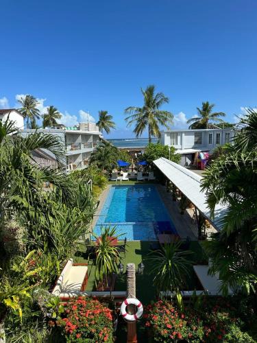 an aerial view of a resort with a swimming pool at Reef Beach Resort in General Luna