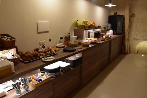 a buffet line with many different types of food at Il Belvedere in Matera
