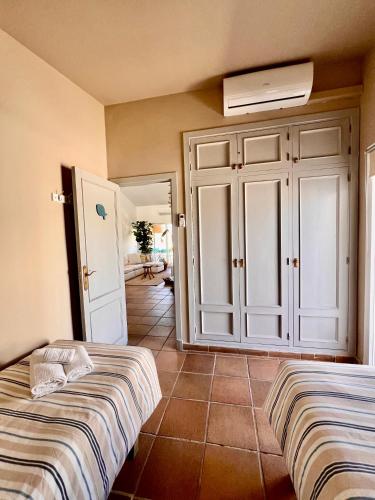 Ένα ή περισσότερα κρεβάτια σε δωμάτιο στο GMHouse Minorca GMH