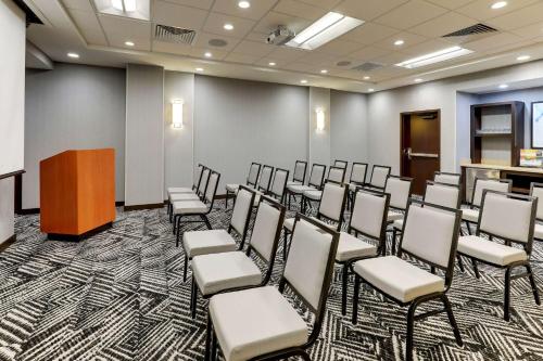 a conference room with chairs and a podium at Hyatt Place St. Louis/Chesterfield in Chesterfield