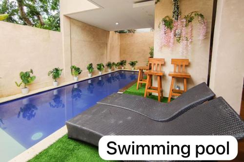 Swimmingpoolen hos eller tæt på Elia Bali heaven villa