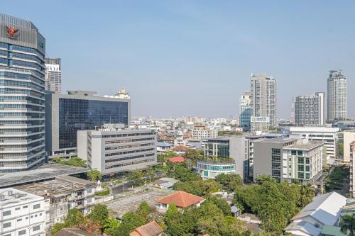 a view of a city with tall buildings at Boss Mansion in Bangkok