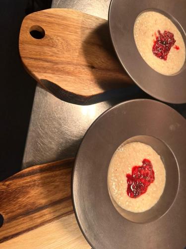 three metal pans with food in them on a table at The Airds Hotel and Restaurant in Port Appin