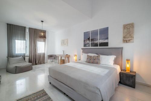 Ένα ή περισσότερα κρεβάτια σε δωμάτιο στο Luxury Villa Aethra -Island Living Paros-