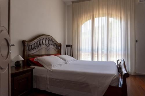 Postel nebo postele na pokoji v ubytování Villa con piscina - Livorno