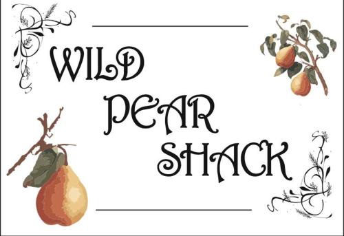 a sign that says wild pear shinder with a pear on a branch at The shack life in Rensburgdorp