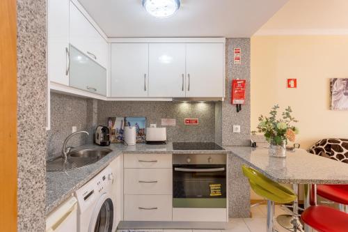 Una cocina o zona de cocina en Lux&Love Apartment