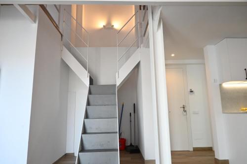 a staircase leading up to the basement of a house at Homenfun Dalt Badalona in Badalona