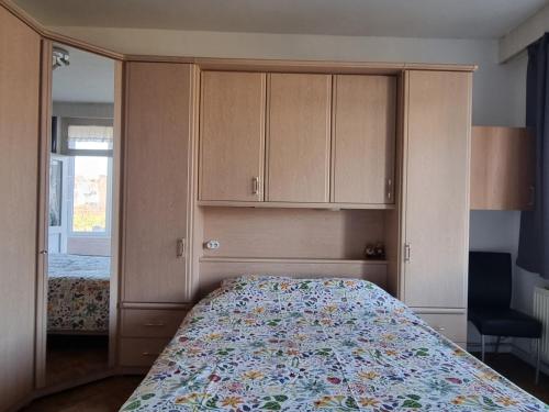 Ένα ή περισσότερα κρεβάτια σε δωμάτιο στο Appartement Ruggeveld