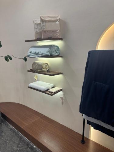 a room with shelves with a car on the wall at Atour Hotel Hefei Jingshang Commercial City North Tongling Road in Hefei