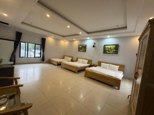 Katil atau katil-katil dalam bilik di Kieu Anh Hotel Phu Tho