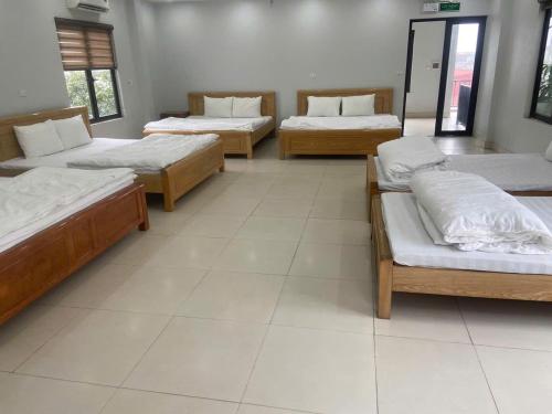 Katil atau katil-katil dalam bilik di Kieu Anh Hotel Phu Tho