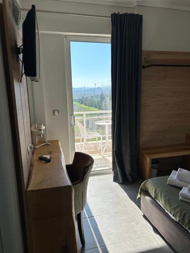 Postel nebo postele na pokoji v ubytování Perea Hotel