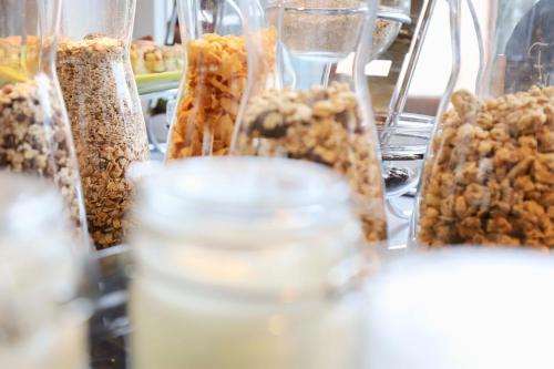 a bunch of different types of food on a table at KAISERS das kleine Stadthotel in Sonthofen