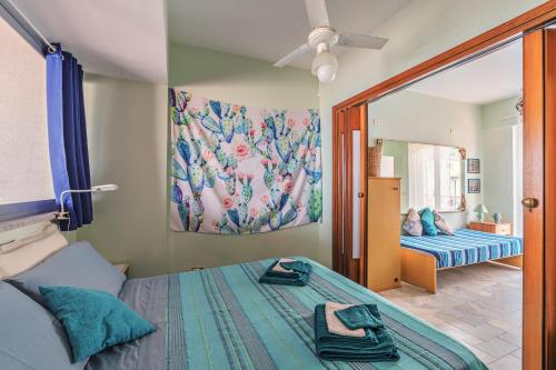 A bed or beds in a room at Una Araucaria sul mare