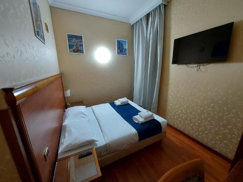 TV a/nebo společenská místnost v ubytování Hotel Positano 2 MIMOSA