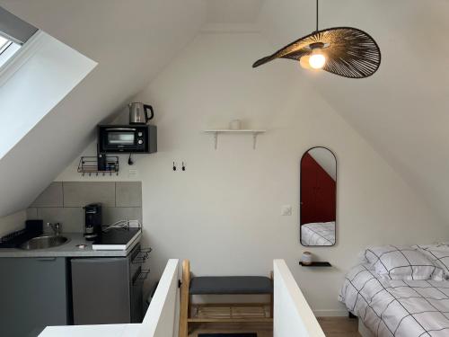 Photo de la galerie de l'établissement Studio Cosy sous les toits, à Roubaix