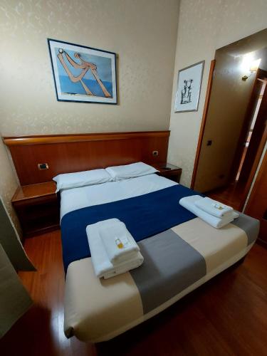 Postel nebo postele na pokoji v ubytování Hotel Positano 2 MIMOSA
