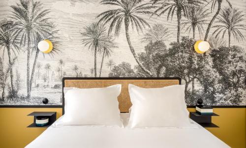 Кровать или кровати в номере Habitat Parisien - Montorgueil Suite