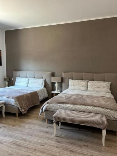 Postel nebo postele na pokoji v ubytování Residenza Guglielmo