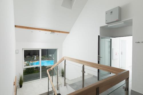 Bazén v ubytování APARTAMENTY przy plaży z basenem z podgrzewaną wodą i mini SPA - Ośrodek Kolonijno-Wczasowy Mewa nebo v jeho okolí