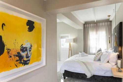 Katil atau katil-katil dalam bilik di Macaron Boutique Guest House