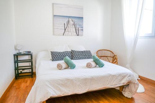 Ένα ή περισσότερα κρεβάτια σε δωμάτιο στο Maison de vacances 7 personnes avec jardin tres agreable