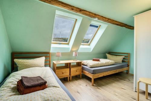 Postel nebo postele na pokoji v ubytování Ferienhaus Fichtelberg