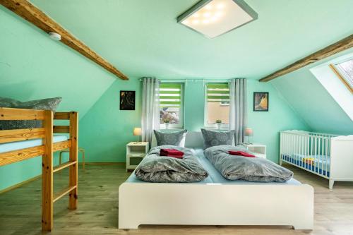Ένα ή περισσότερα κρεβάτια σε δωμάτιο στο Ferienhaus Fichtelberg
