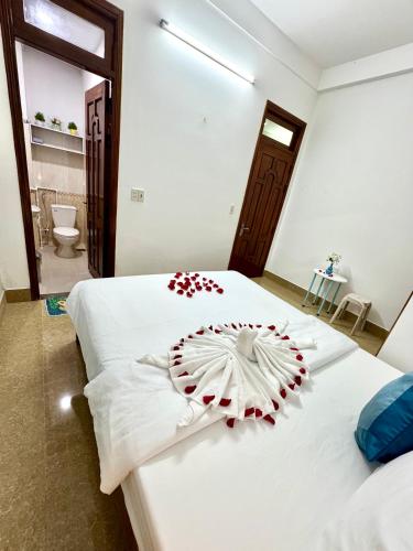 Postel nebo postele na pokoji v ubytování T&T Homestay Hue