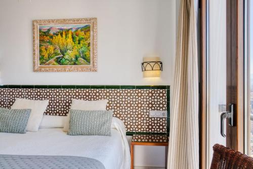 Ένα ή περισσότερα κρεβάτια σε δωμάτιο στο Hotel Mirador Arabeluj