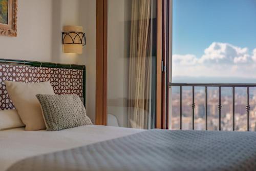 Ένα ή περισσότερα κρεβάτια σε δωμάτιο στο Hotel Mirador Arabeluj