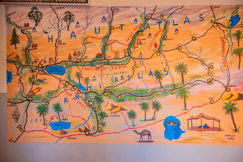 a map of the desert on a wall at Hostel Afgo Rooftop in Ouarzazate