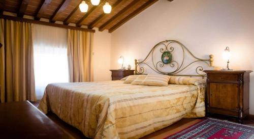 Posteľ alebo postele v izbe v ubytovaní Dimora Palazzo La Fenice