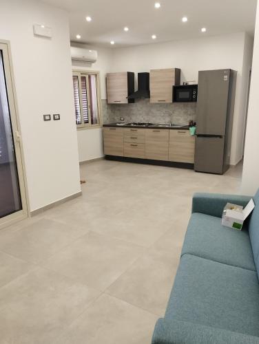 Η κουζίνα ή μικρή κουζίνα στο RineddaHouse Arenella - Vista Mare Panoramica a Palermo con Parcheggio privato