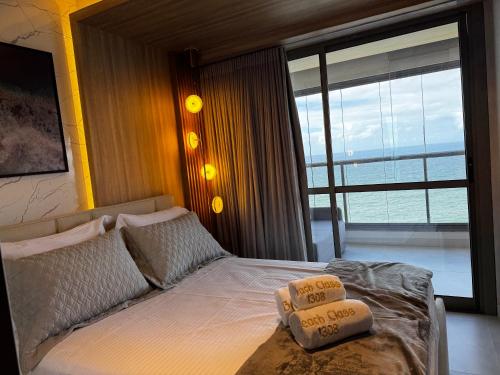 Postel nebo postele na pokoji v ubytování Refúgio das ondas - BeachClass Ondina