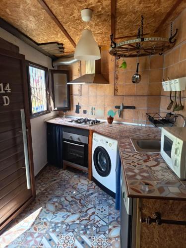 Η κουζίνα ή μικρή κουζίνα στο Casa Amelie