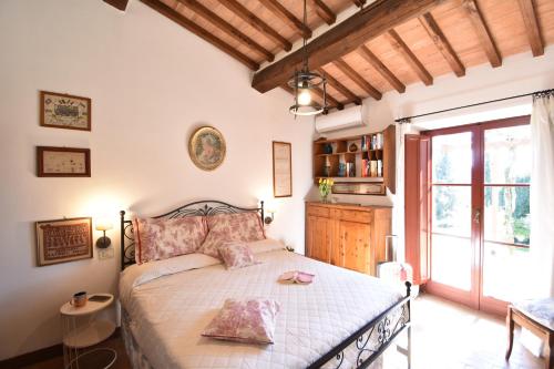 Ένα ή περισσότερα κρεβάτια σε δωμάτιο στο Villa Siena