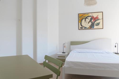 Ένα ή περισσότερα κρεβάτια σε δωμάτιο στο Casa Del Sole a 50 mt dal mare - Aria condizionata