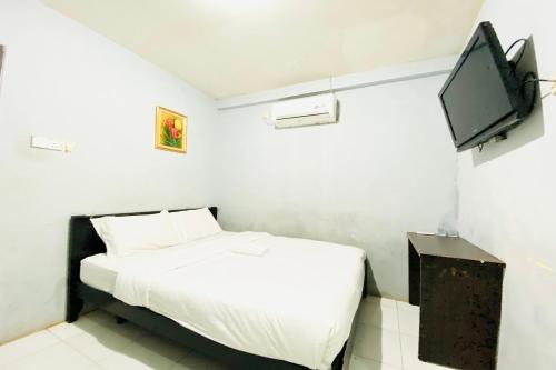 Μια τηλεόραση ή/και κέντρο ψυχαγωγίας στο Hotel O Jodoh Near Grand Batam Mall Formerly Agung Hotel
