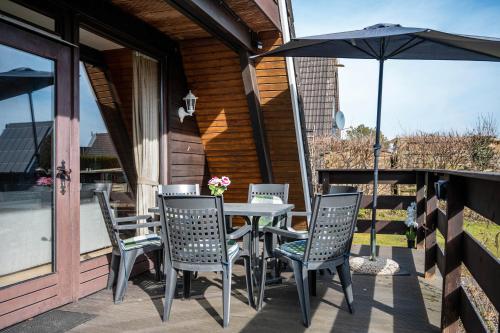 Balkón nebo terasa v ubytování Hafenhuus am Meer