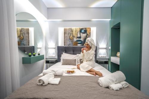 Postel nebo postele na pokoji v ubytování Amelia luxury Suites
